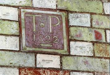 Picture 1. The datestone, set among Joseph Arlidge bricks, commemorating the new building at the Brickyard.