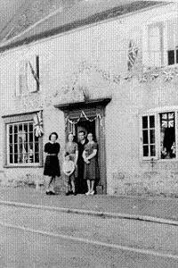 Vine Cottage, Guilsborough Road on VE Day: The Ainge/Stanley family.