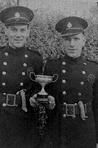 Fire Service Cup. Alan Lord and Ernie Adams with the Cup won by the West Haddon Fire Service Team.
